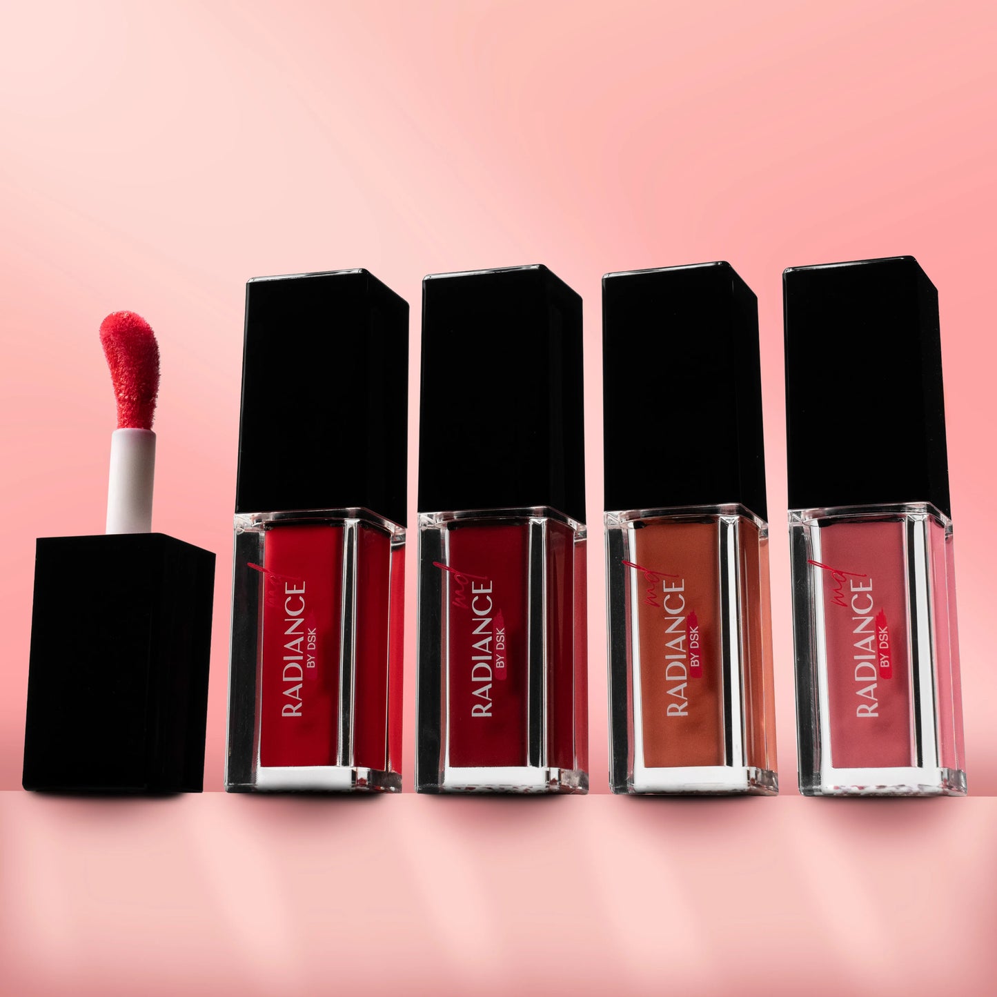 Set of Radiance lipsticks on a pink background